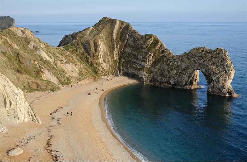 Durdle Door landmark - a natural limestone arch sitting in the sea