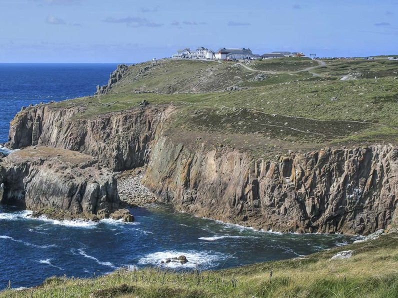 View of cliffs meeting the sea