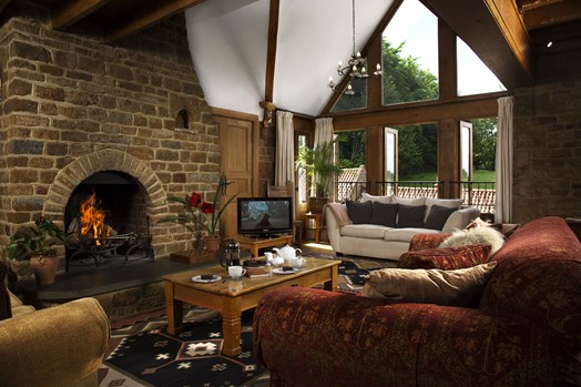 Fire and french windows in cottage