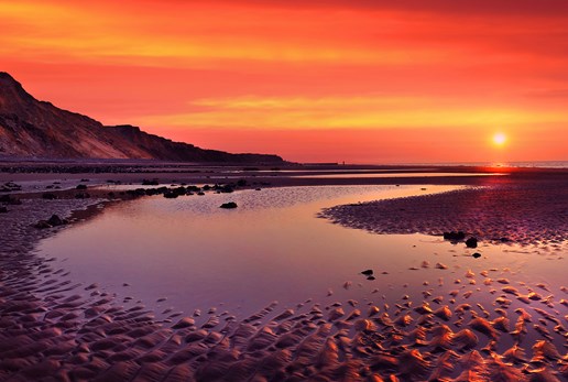 Sunset at Runton Beach Poppyland Holiday Cottages