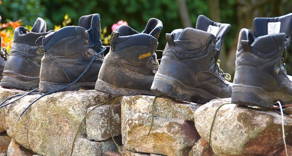 Walking boots on wall