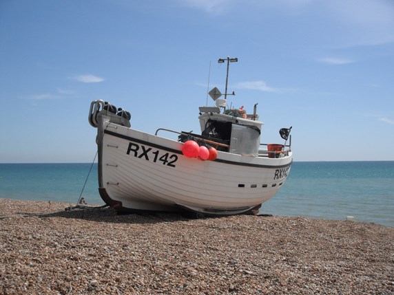 Boat on shingle at Hastings Beach