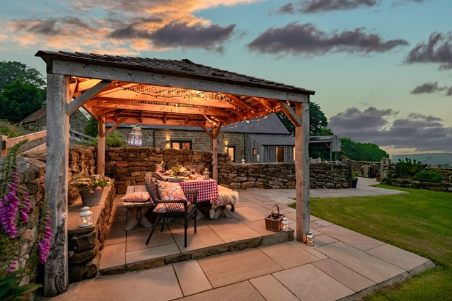 Outside dining area at a luxury holiday cottage