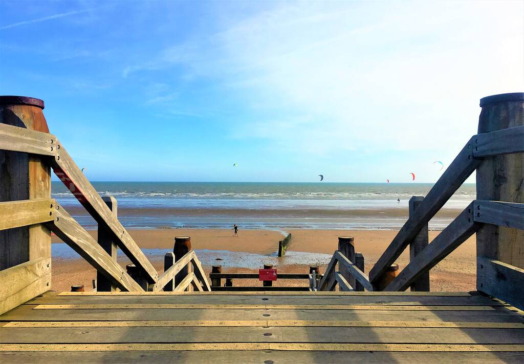 View from wooden steps to the sea in Sussex