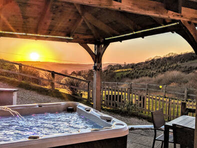 Bubbling hot tub with views