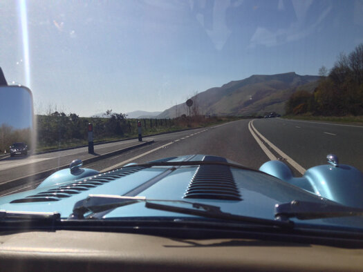 View of the road outside of a car