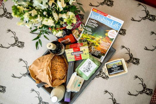 Milk, bread and other essentials on a table