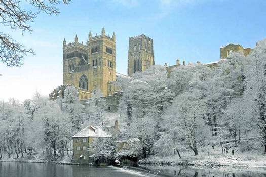 Castle by a snowy lake