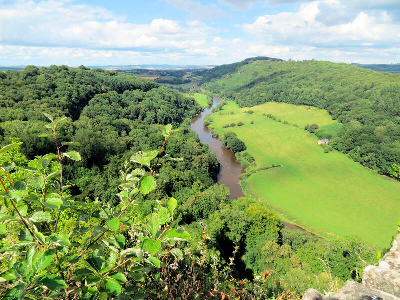 Looking down at a river snaking through the countryside