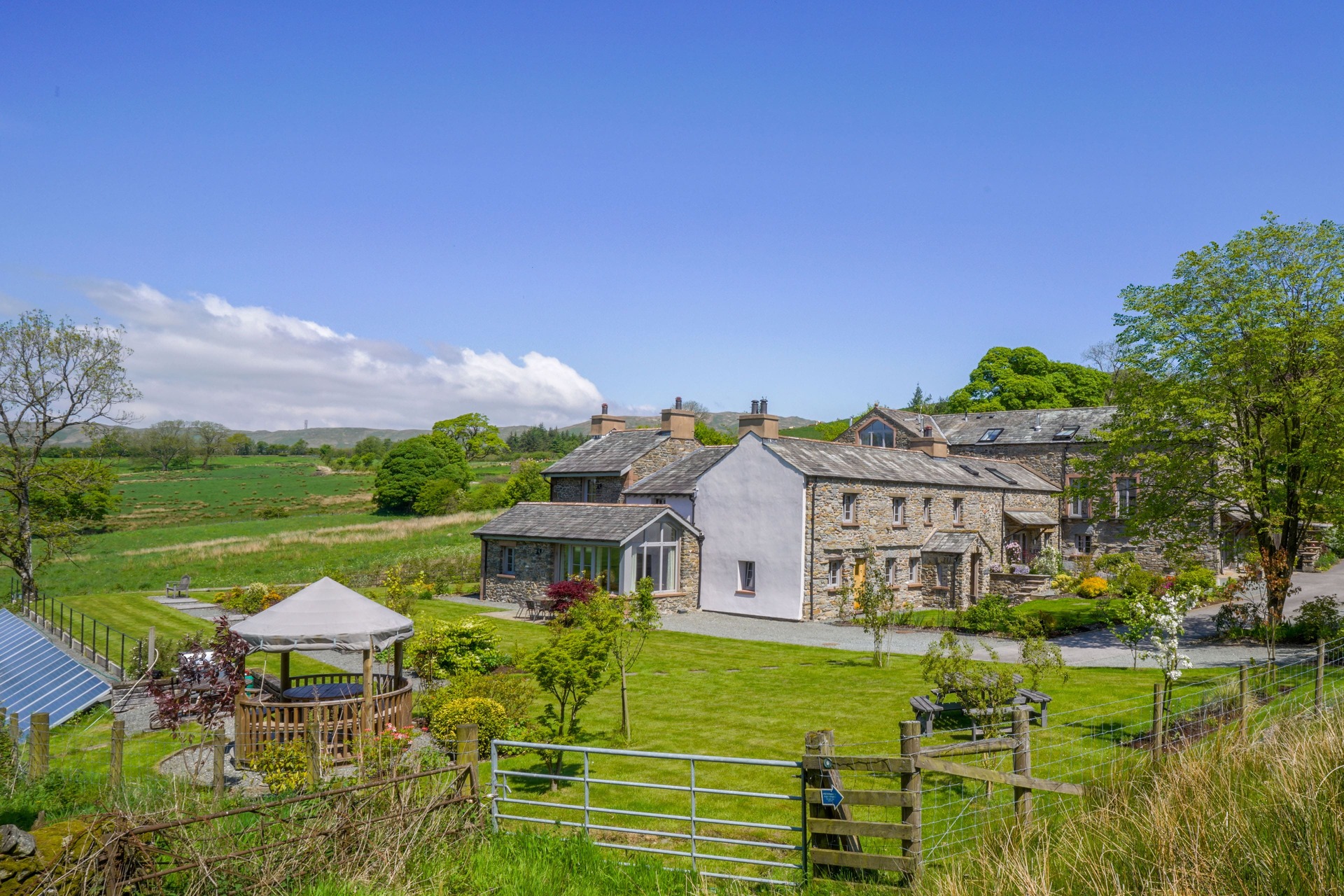Holiday cottages in the Cumbrian countryside on a sunny day