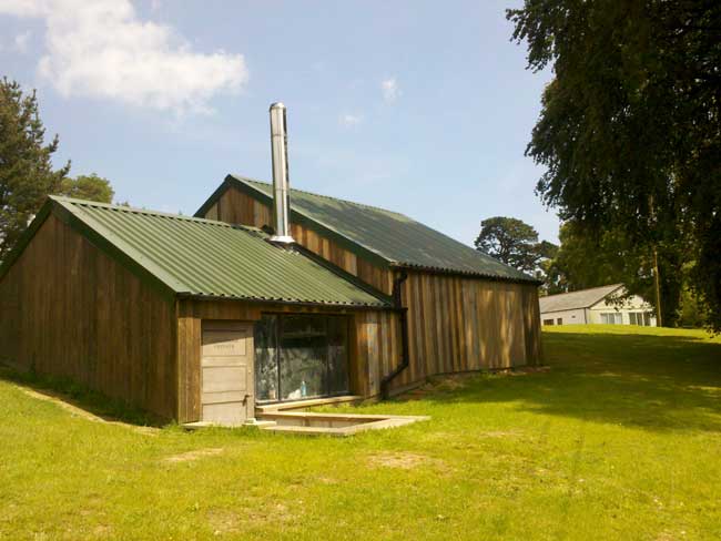 Biomass heating shed