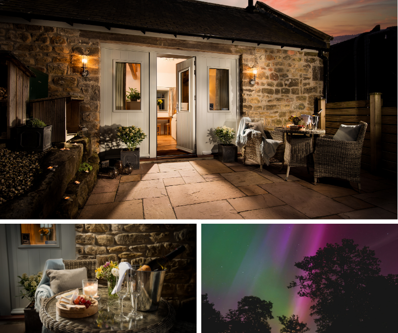 Outdoor courtyard of cottage with wine and cheese with photo of northern lights